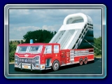 Fire Engine Slide 18' feet high - Our newest addition will fulfill every child���s dream to play fire fighter. As a tribute to those brave men & women, we have added this great fire engine slide to our inventory. Slide down the ladder onto this unique inflatable.