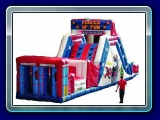 Superhero Challenge - 14' X 38' long - The Superhero Challenge Obstacle Course is a very popular choice for many of our clients. This obstacle course offers many challenges and is the ideal attraction for all ages. Kids enjoy going through the obstacle that consists of a bounce area going through tubes, up the wall and then down the slide.